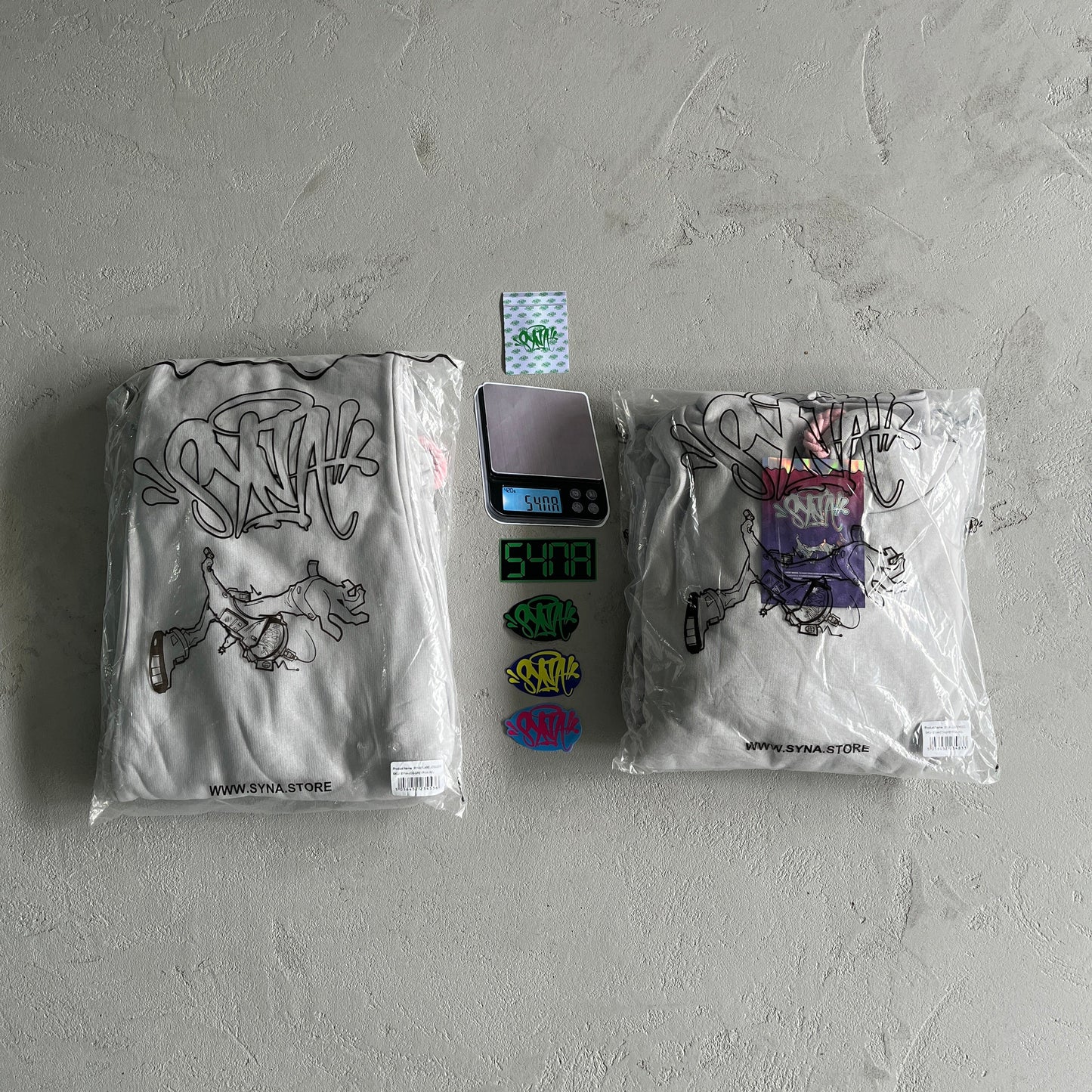 mens grey/pink tracksuit "syna wrld"